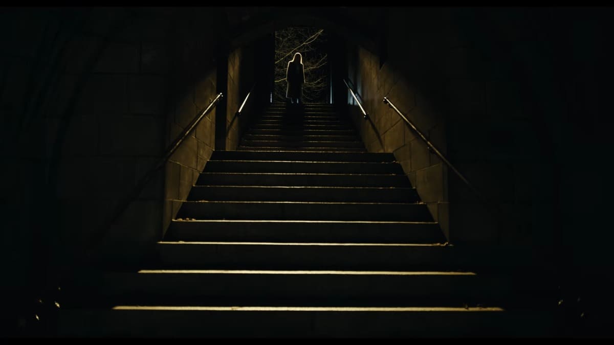 Scarlett Johansson walks down the spooky stairs in The Exorcist: Martyrs trailer