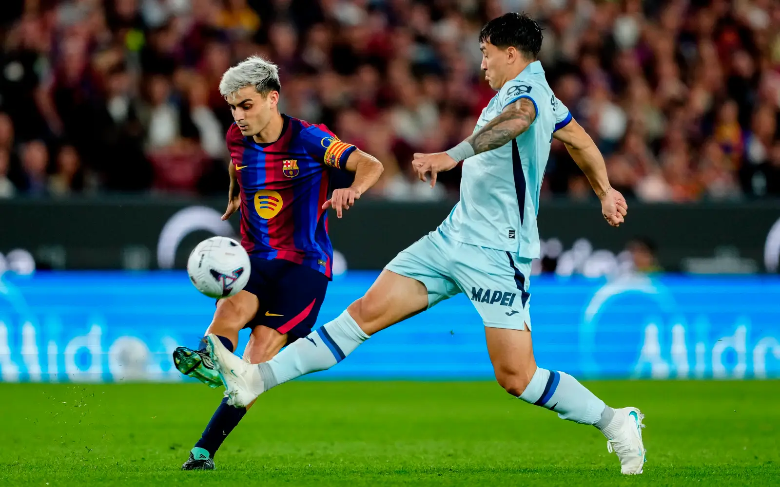 Barca extend perfect streak, Atletico scrape late win