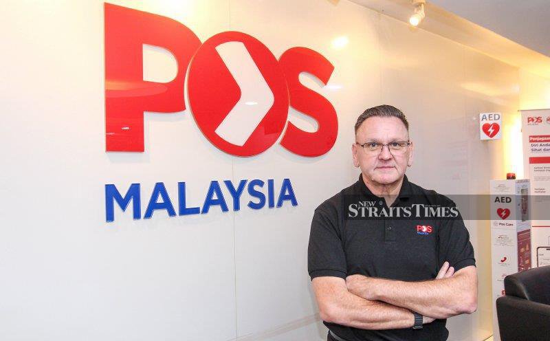 Pos Malaysia eyes stronger 2H as losses narrow