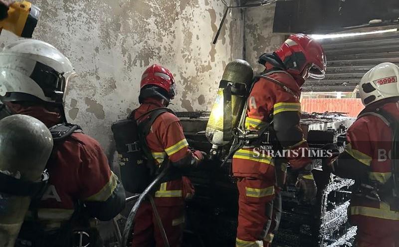 Man injured while trying to put out fire at EV battery storage room