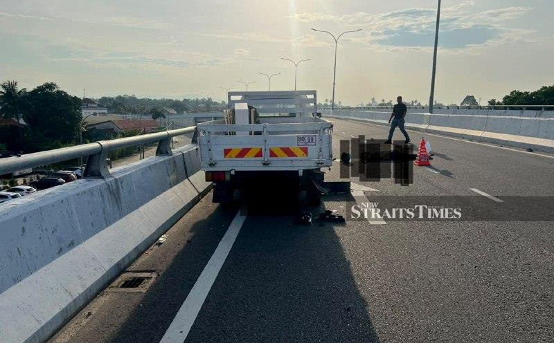 Motorcyclist dies after crashing into stalled lorry