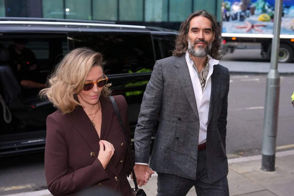 Russell Brand appears in a London court for trial on rape and sexual assault charges