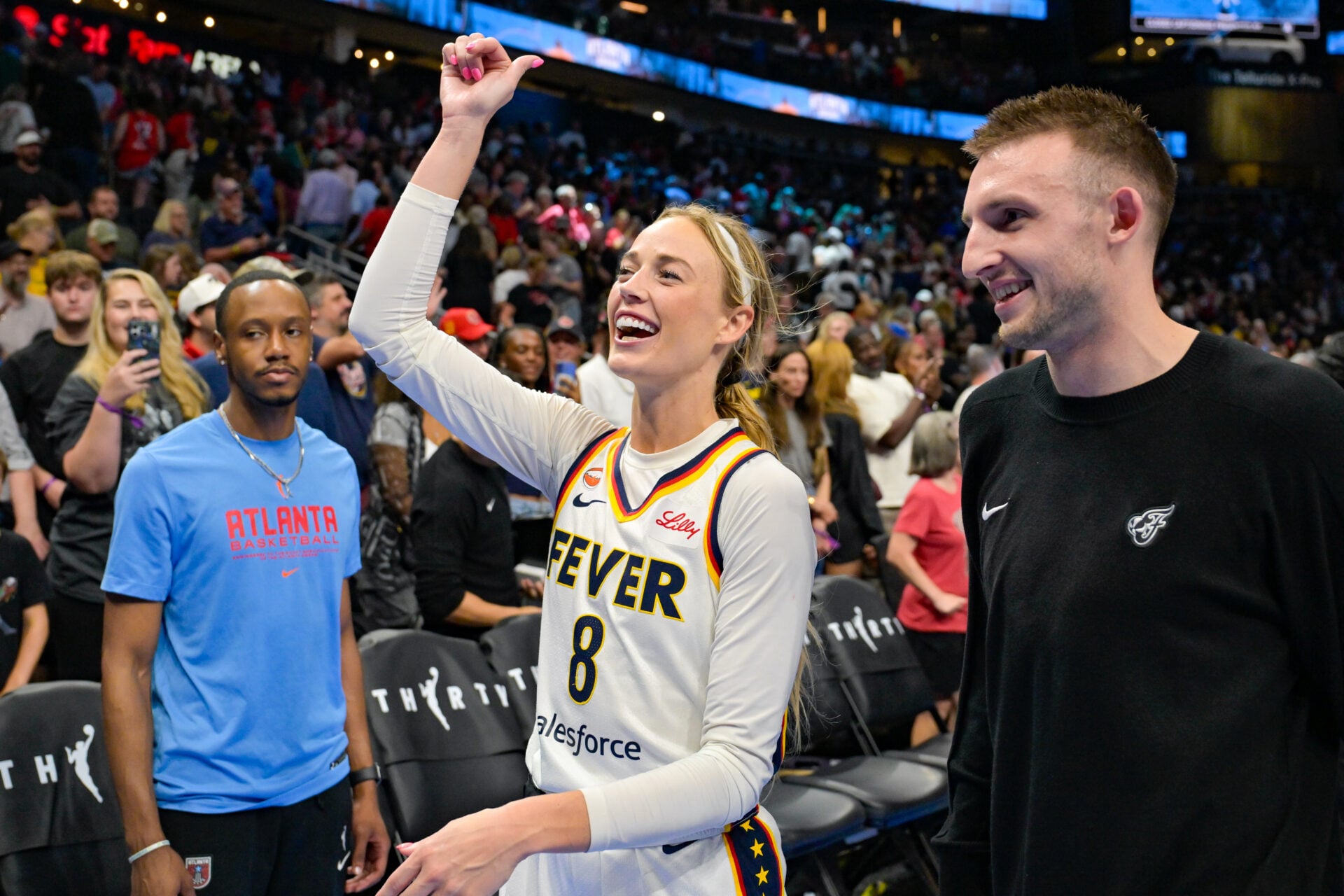 Fever players celebrate Sophie Cunningham’s 30th birthday in locker room after tough OT win