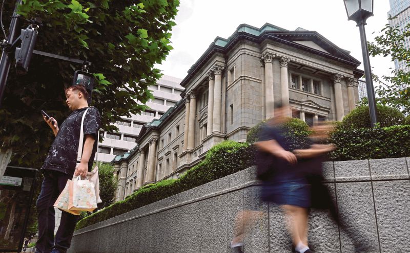 Japan's wholesale inflation remains elevated, keeps alive BOJ