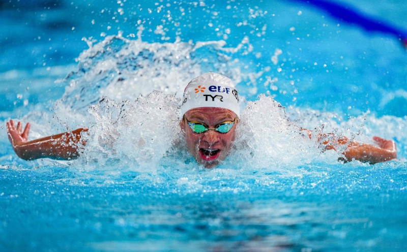 Golden boy Marchand goes off script to rule the pool in Paris