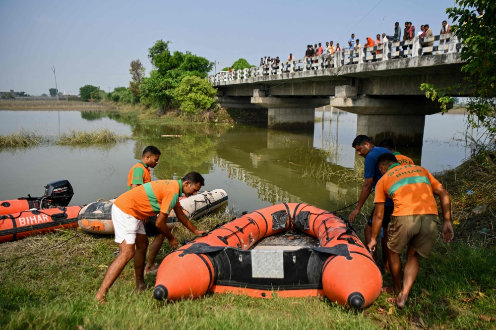 Overloaded boat capsizes en route to Hindu festival in India, killing 13 children