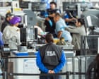 Why are so many Americans forced to work standing up – unlike their president? | Arwa Mahdawi