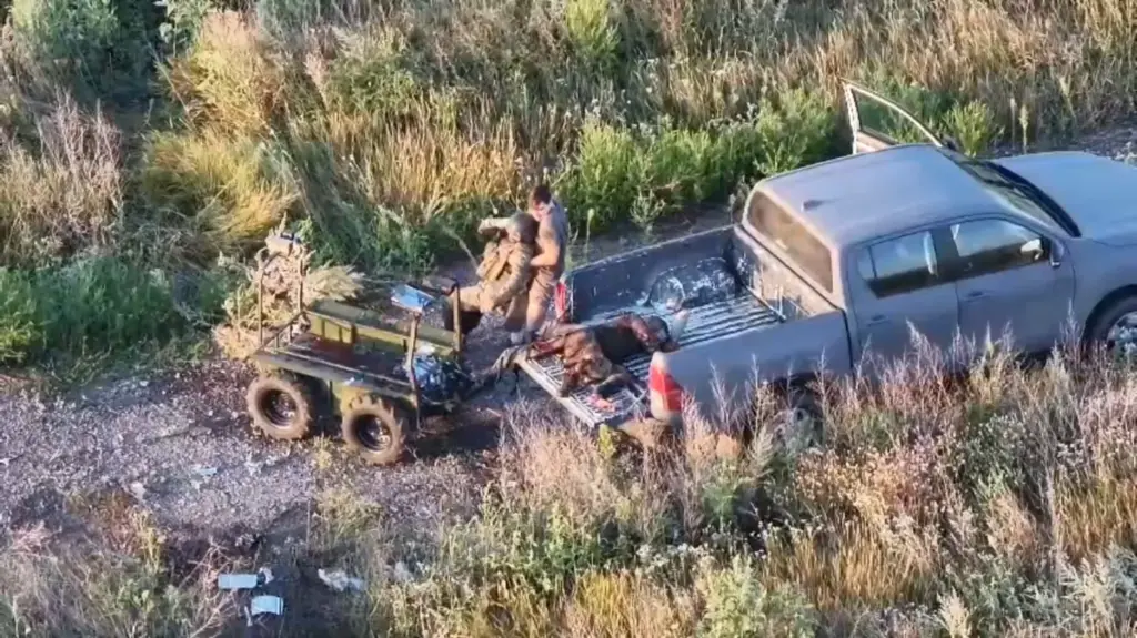 A Russian drone knocked out an evacuation robot, so a Ukrainian commander drove into the kill zone in a pickup to save two wounded soldiers