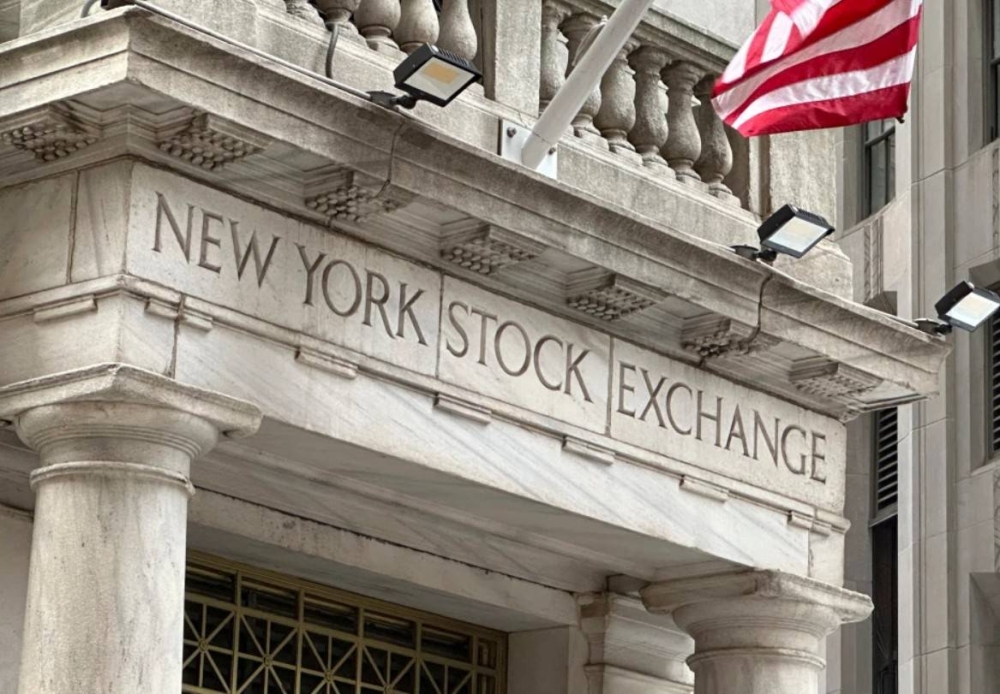 Wall Street slides as inflation fears push yields higher