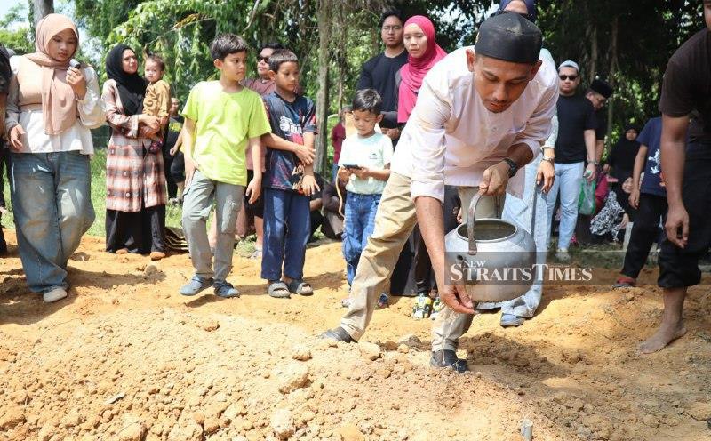 Mother, son killed in Temerloh tanker crash laid to rest
