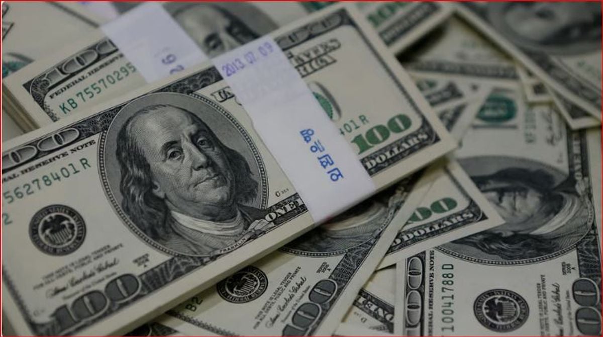 Dollar retreats from 18-month high despite strong US inflation data