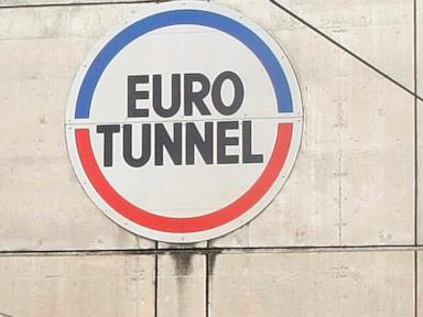 Minibus slams into Channel Tunnel shuttle train, injuring 19 and halting service