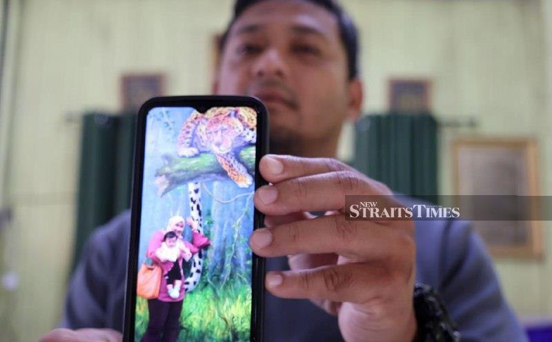 Family stunned by suspect's call informing them of Customs officer's death