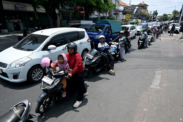 Kilometer-long queues, traffic jams as fuel shortages hit Bali