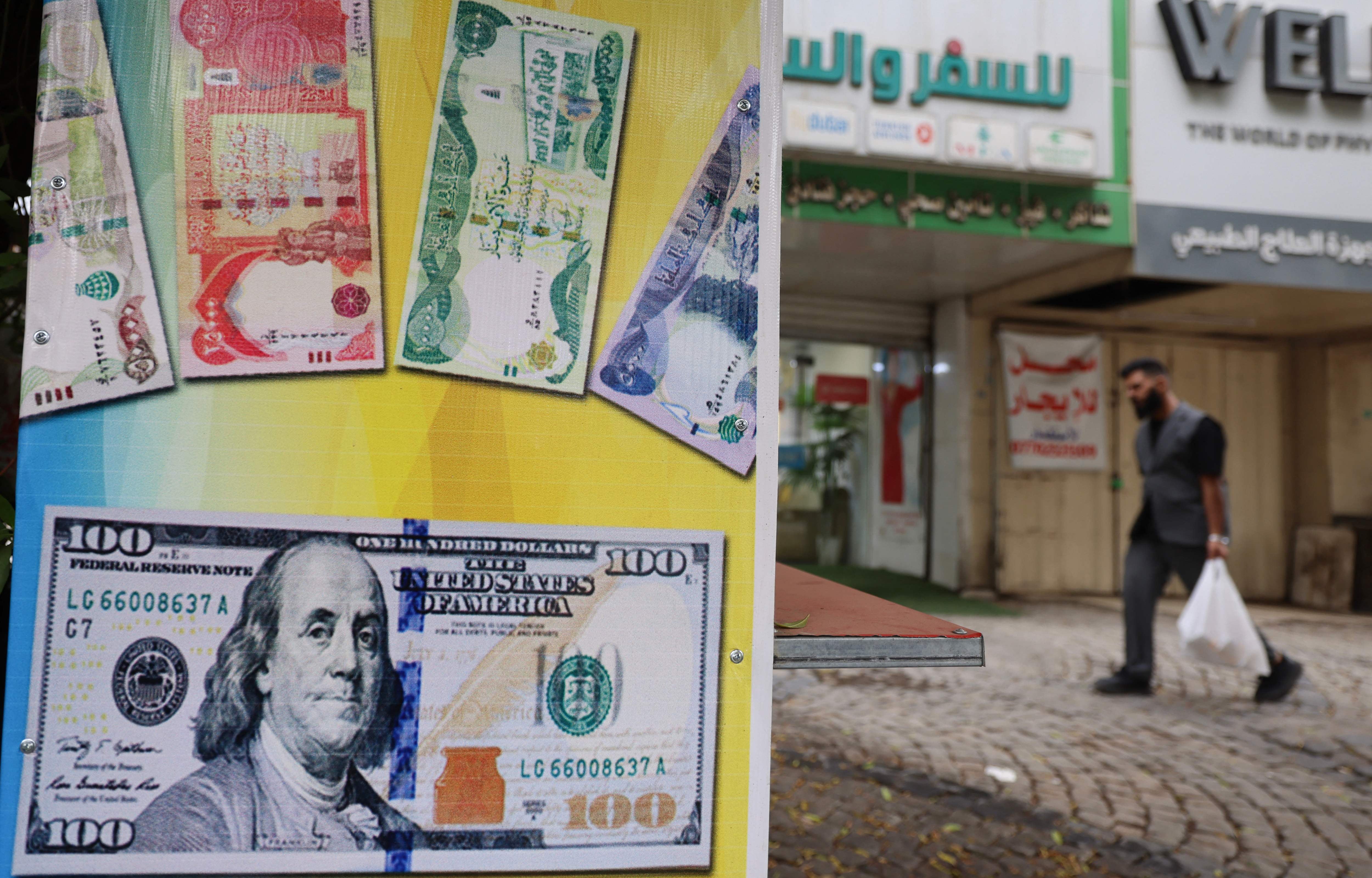 Iraq’s dinar devaluation tests efforts to protect consumers from rising prices