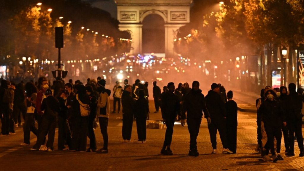 Scores detained in Paris as protesters clash with police during nationwide demonstrations in France