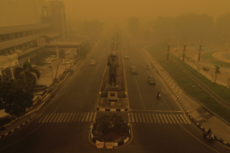 Haze from forest fires still blankets Sumatra, Batam Islands