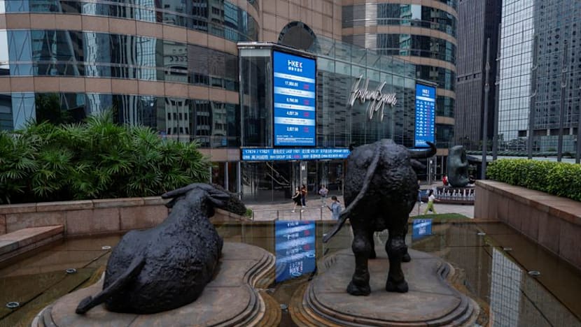 Asian stocks slip, Wall St and bonds benefit from oil skid