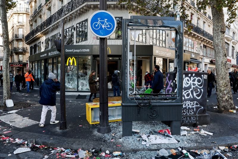 As France reels from violence, Macron points to security failings
