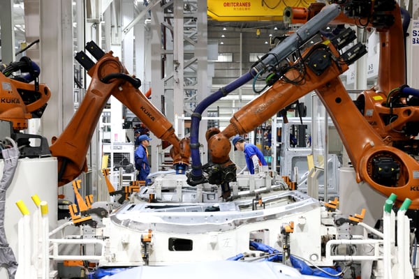 China's economy grew 4.5% in the third quarter, beating forecasts on export surge