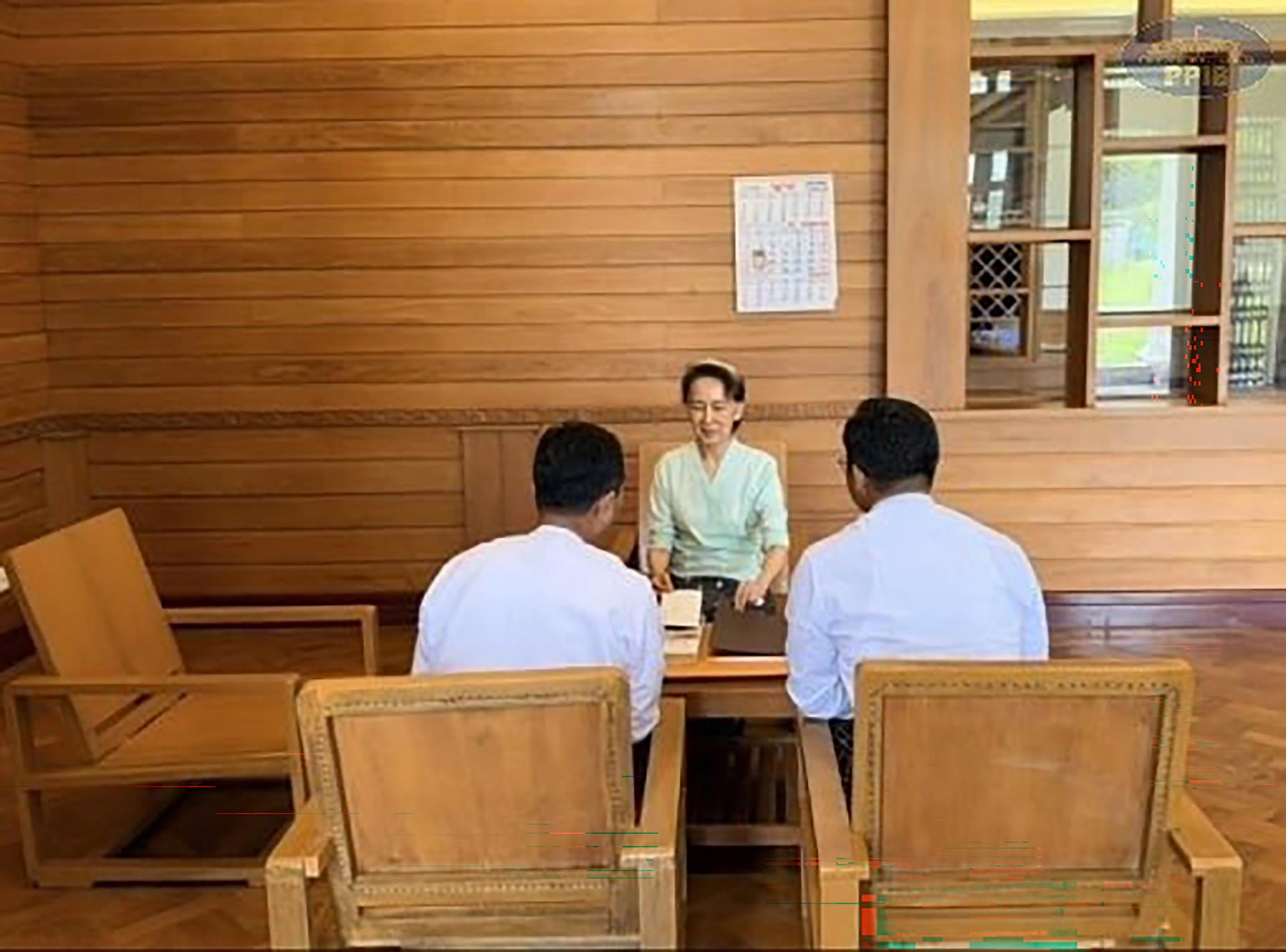 Rare photos of Myanmar's ex-leader Suu Kyi show her receiving books sent by King Charles III