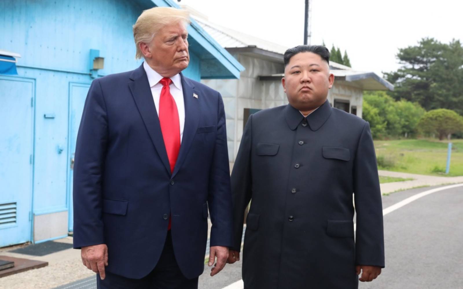 Trump hints at Kim contacts after scaling back Seoul drills