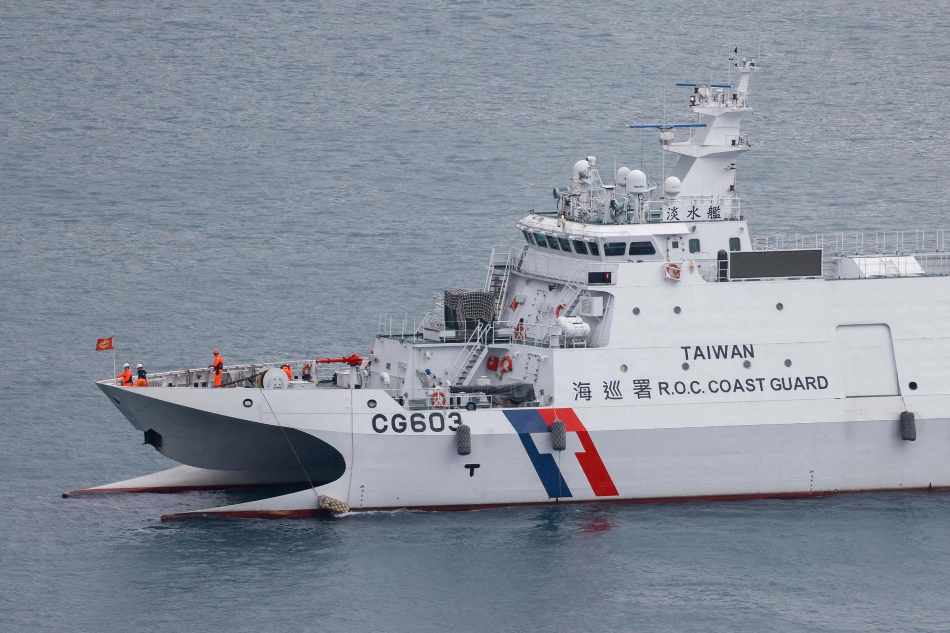 China says it is 'safeguarding order' around Taiwan-controlled South China Sea atoll