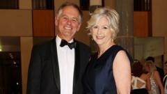 Australian MP loses both legs after alleged car attack, husband says