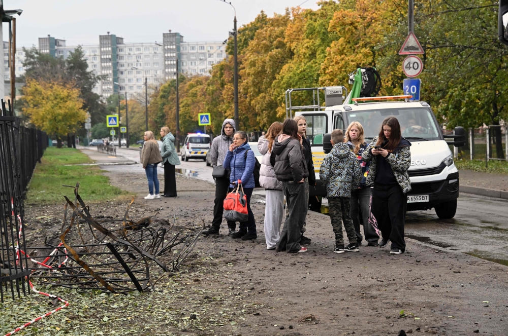 Kyiv residents juggle school runs, power cuts and Russian drone attacks
