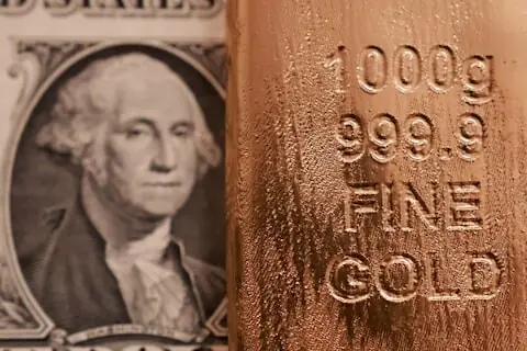 Gold drops over 1% as oil rally reinforces higher-for-longer rate outlook