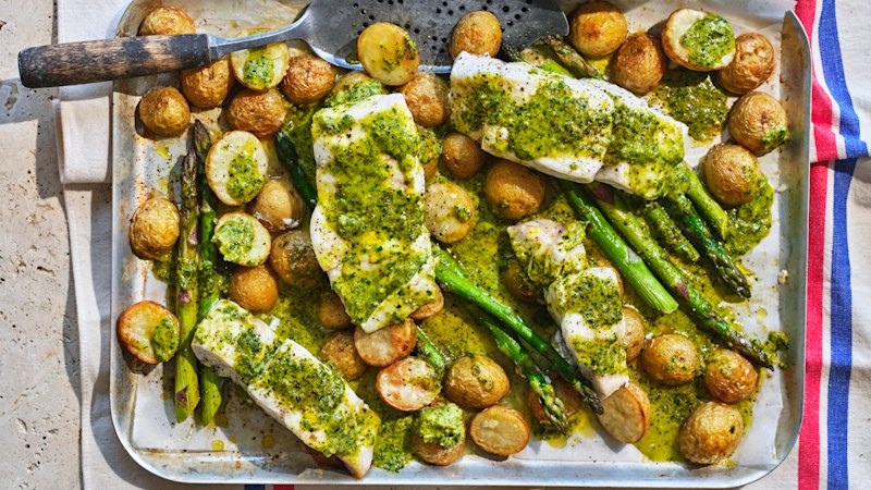 Baked fish with potatoes, asparagus and Montpellier butter