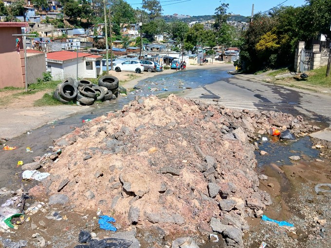 Raw sewage floods this Durban main road