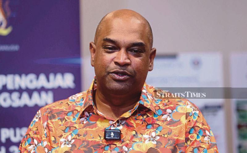 Govt reviewing RM1,700 minimum wage