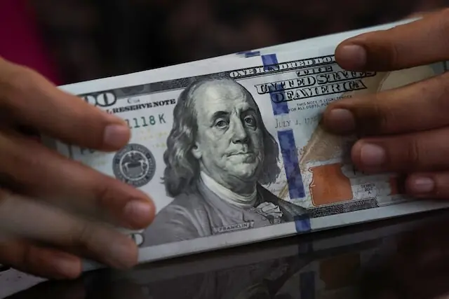Dollar feeble as rate hike bets dwindle, Iran war worries grow
