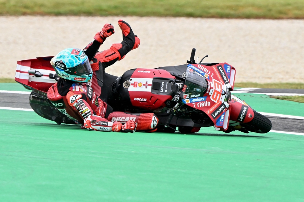 Big brother Marc Marquez crashes, hops on spare bike and still beats Alex to pole at Australian MotoGP