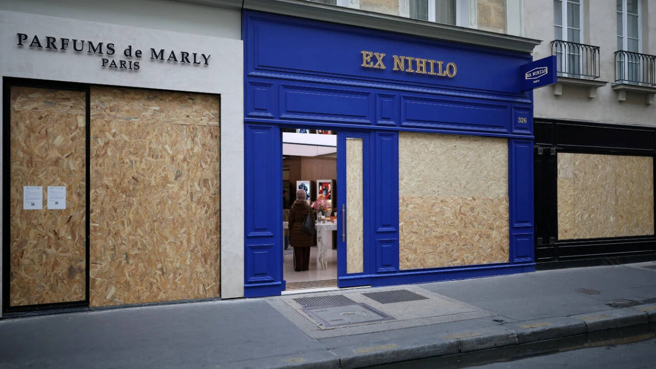 Watch: Paris shops increase security, board up windows, as France braces for protests