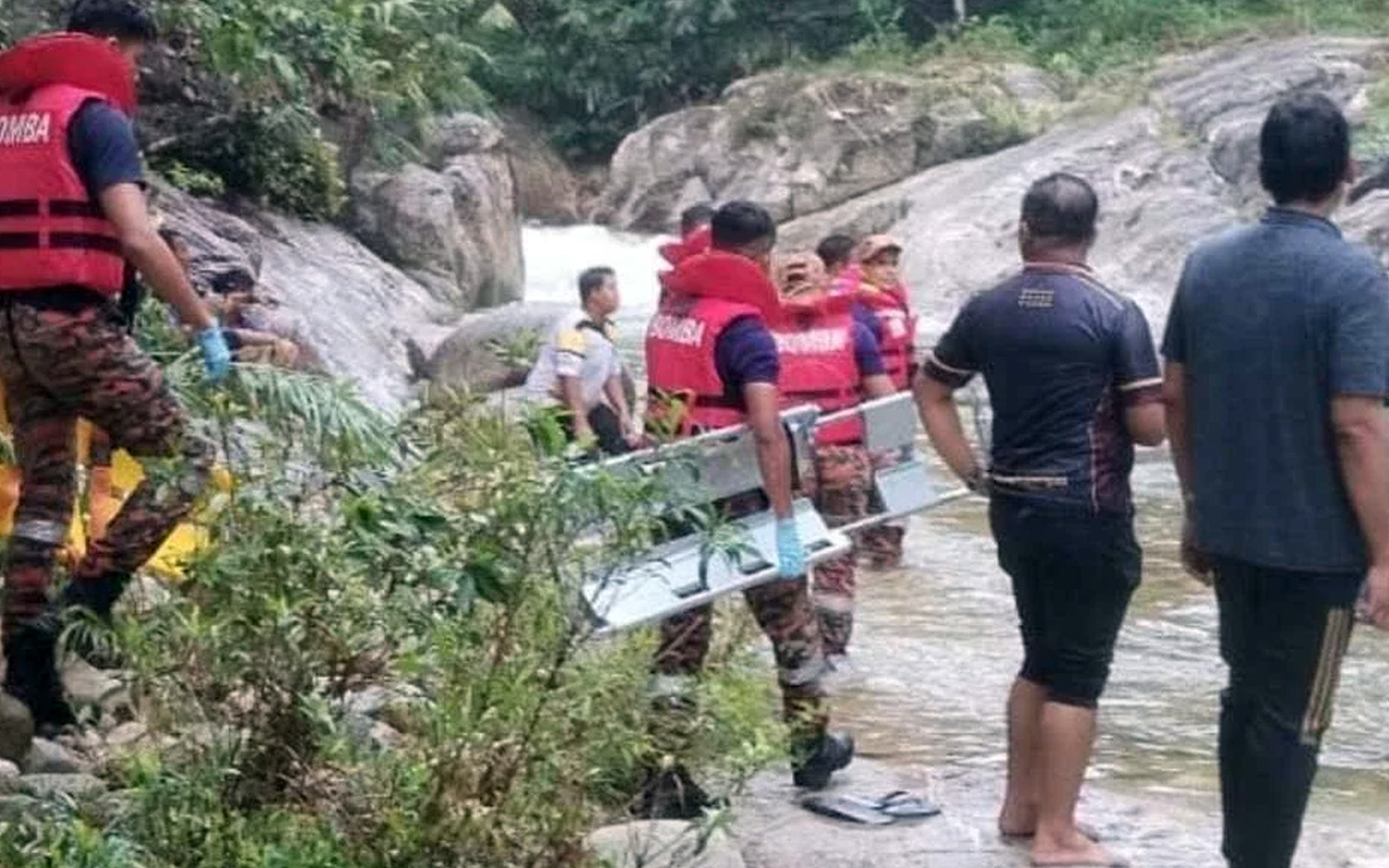 2 found dead on riverbank in Perak
