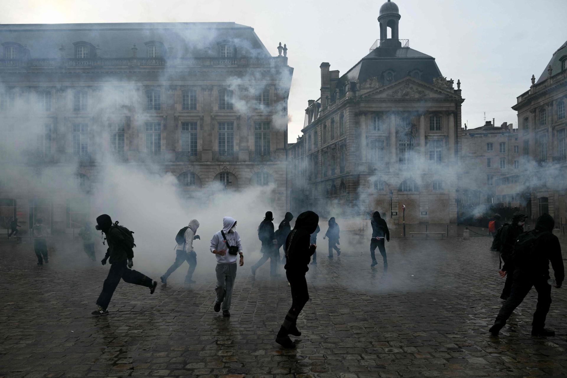 Thousands march in France over schools and living costs as police use tear gas