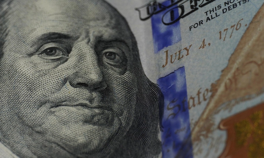 Dollar inches up against dong