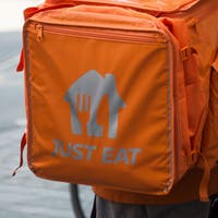 "The winner takes it all": Uber Eats and Just Eat are engaged in a brutal fight for dominance on the streets of Switzerland