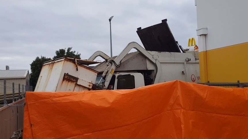 Former support worker gives evidence during inquest into death of boy sleeping in skip bin
