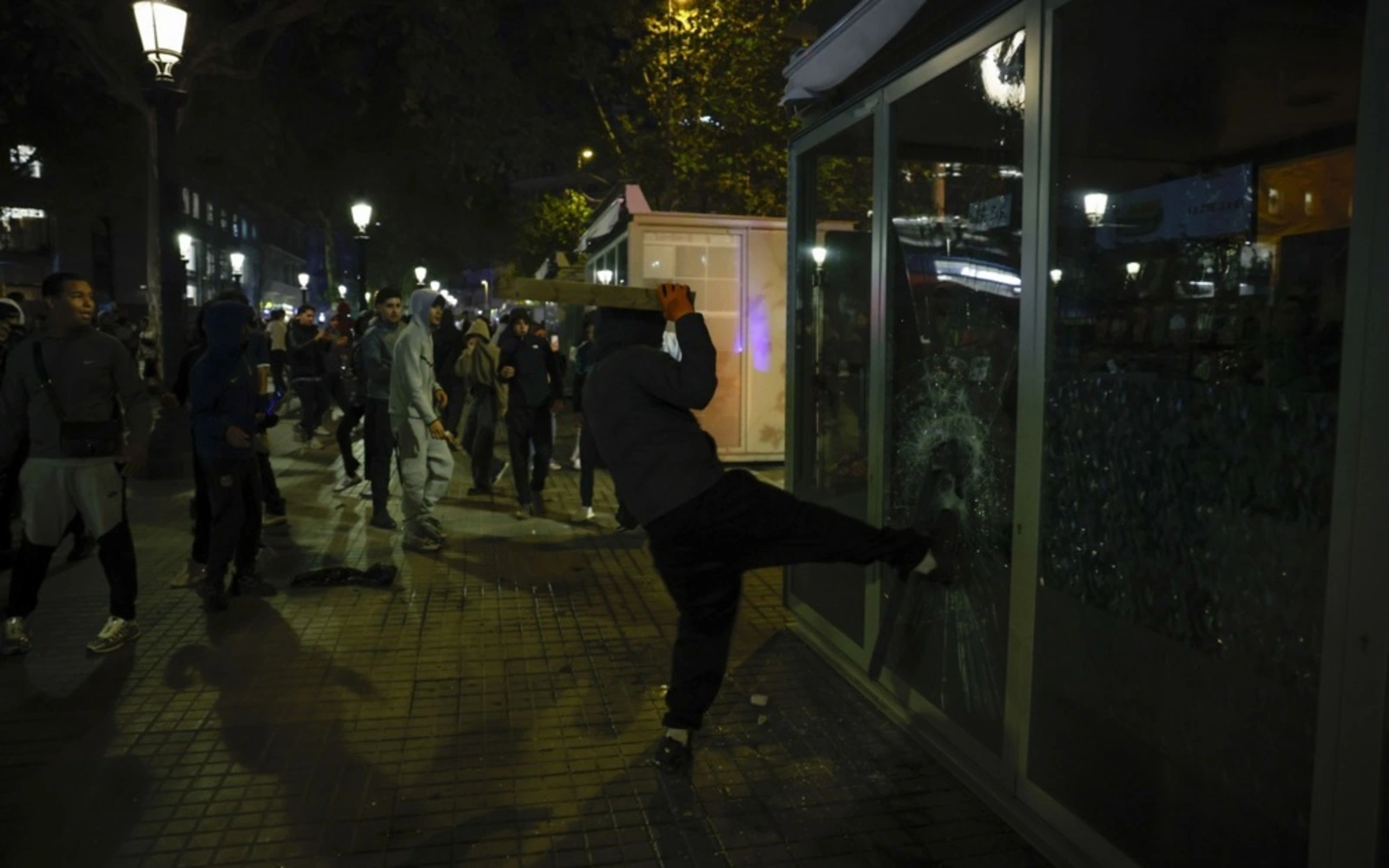 Spanish police make 128 overnight arrests in Barcelona over looting