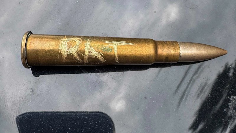 A bullet on the windscreen, a firefighter’s old badge number: The message left on a Victorian minister’s car