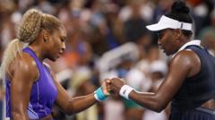 Williams sisters lose on doubles return