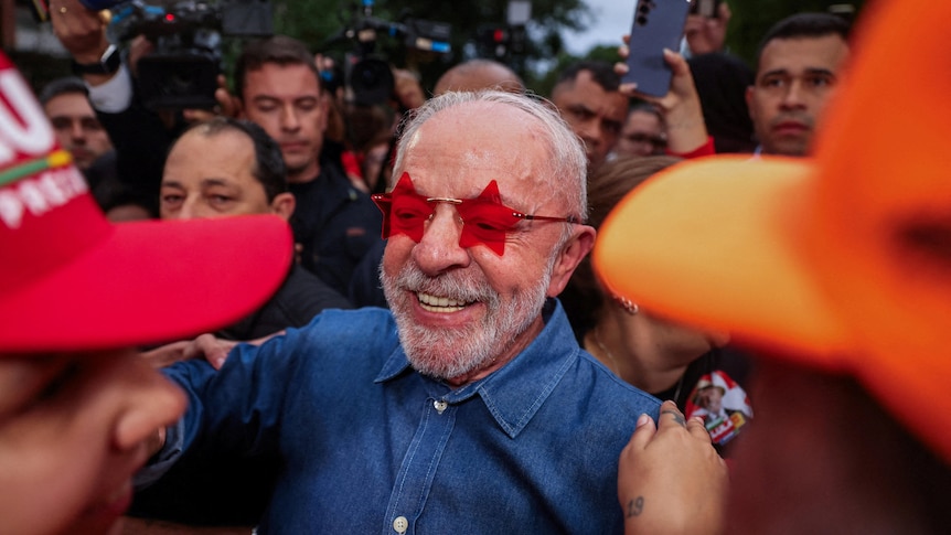 Lula celebrates unlikely victory in Brazil as Bolsonaro rejects results