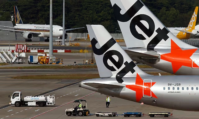 Australia's Jetstar to charge for carry-on bags in overhead lockers next year