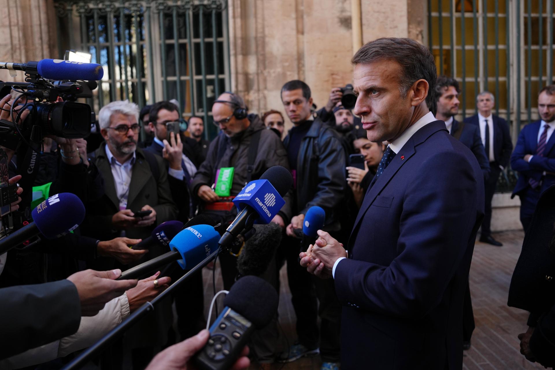 France's Macron promises 'strong measures' to assuage protests
