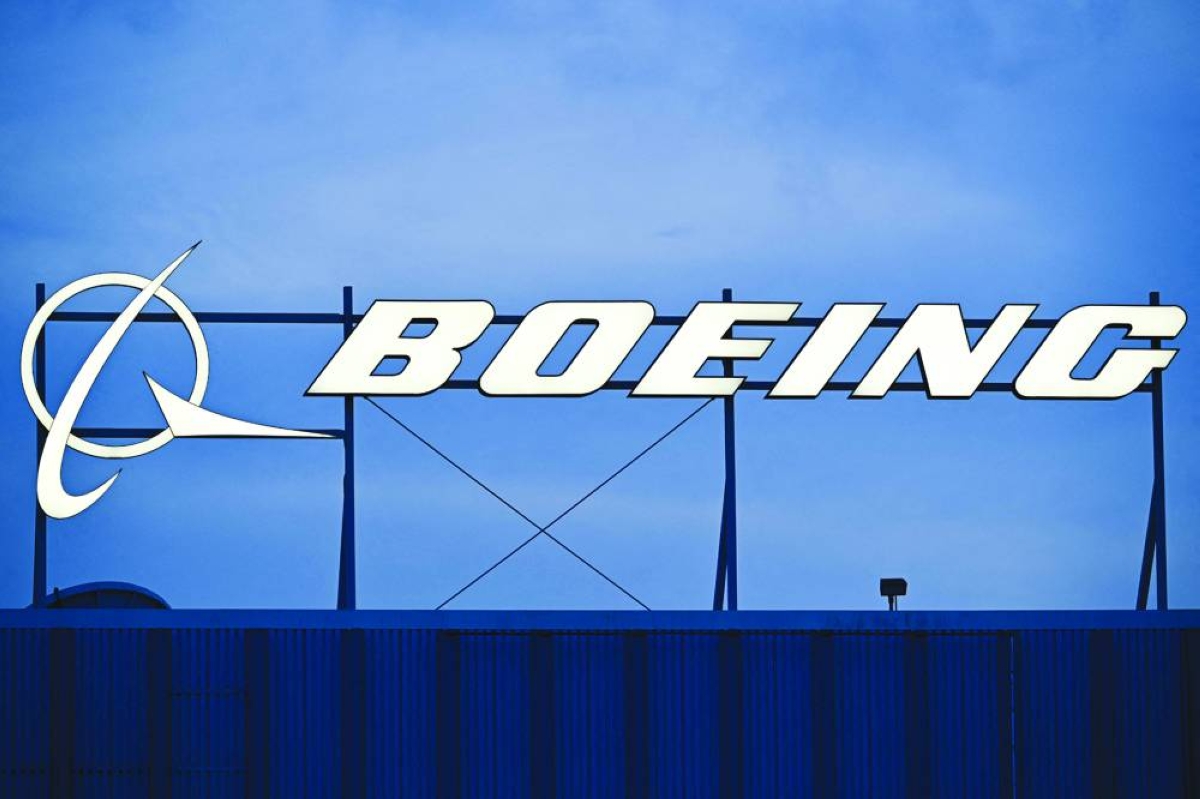 Boeing reports smaller loss as it aims for stable output growth