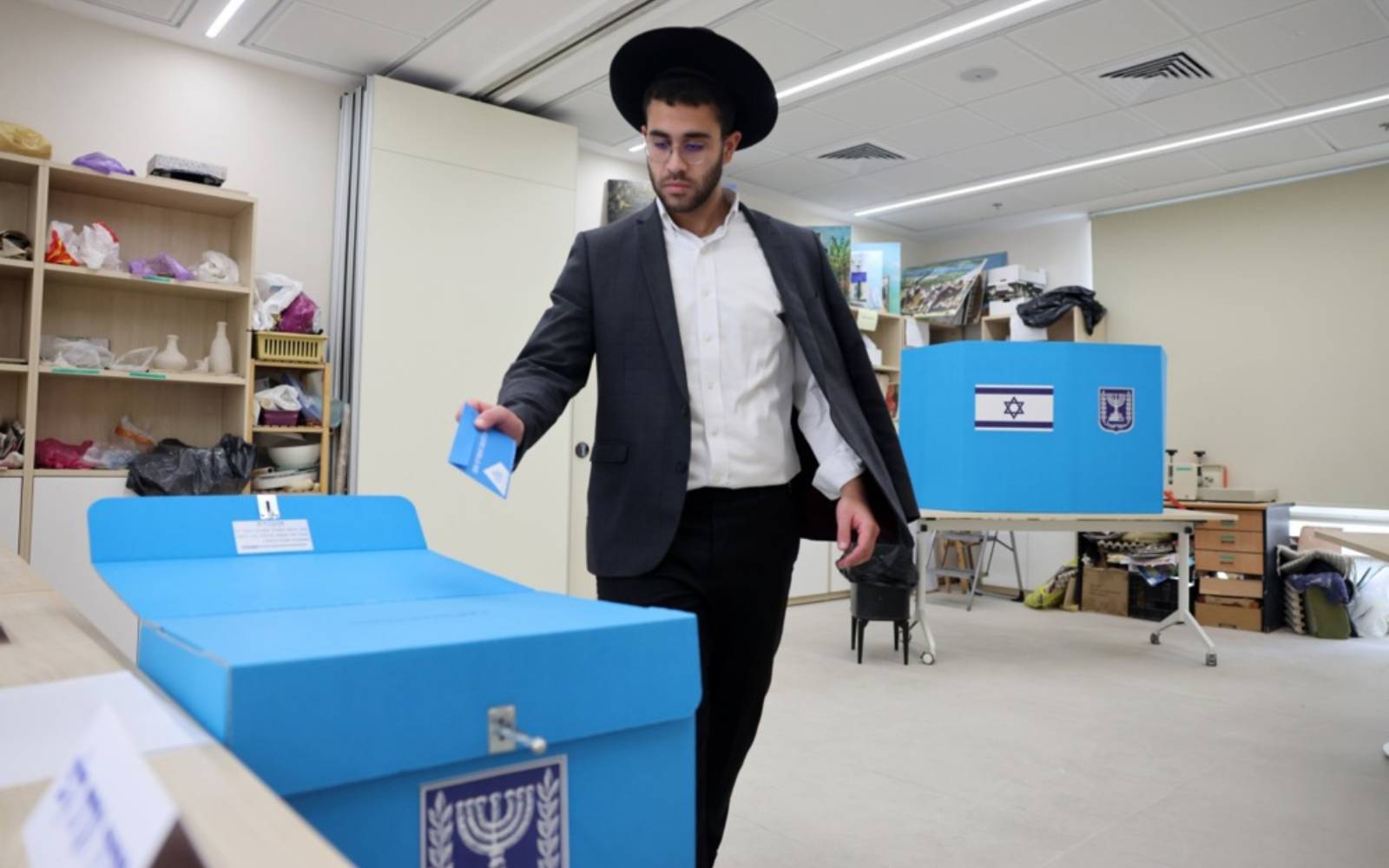 First Israeli election exit polls show narrow edge for opposition