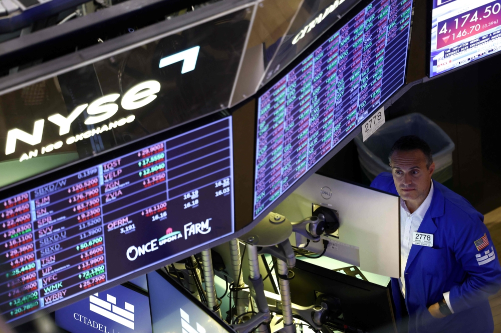 AI stocks lift Wall Street ahead of Fed decision and tech earnings